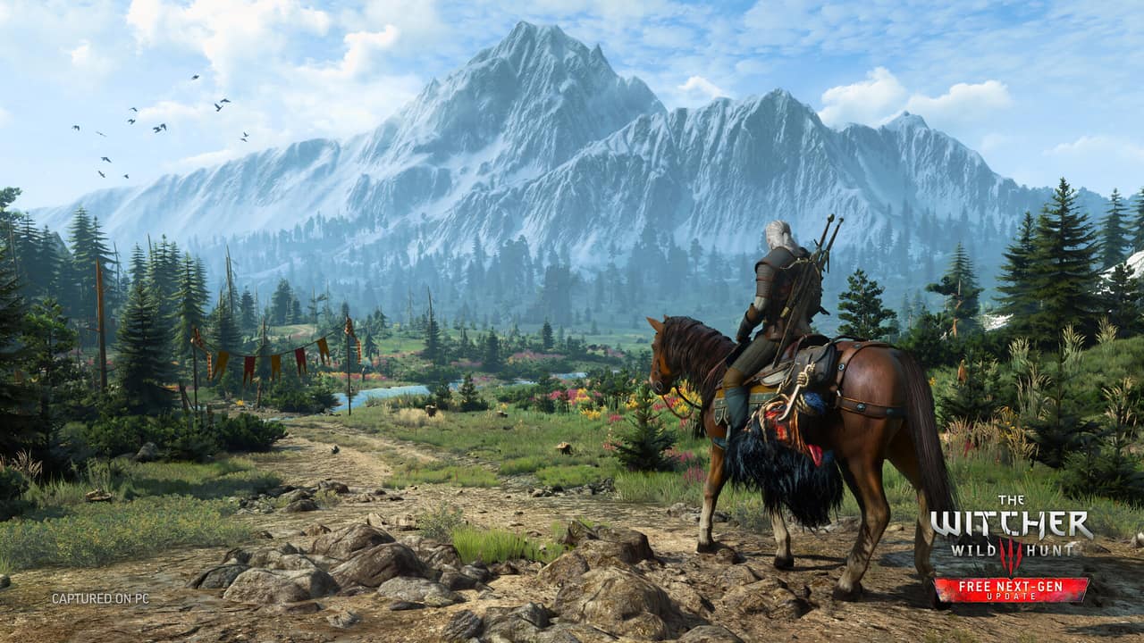 A lone rider before a great mountain valley